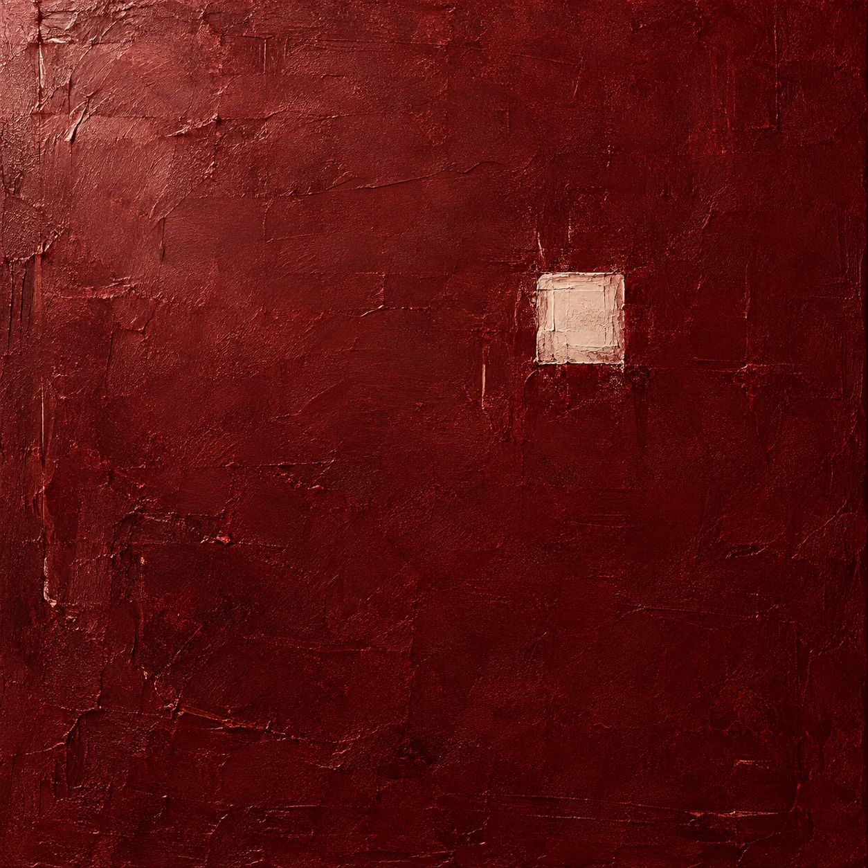 A lone small square floating in a vast field in burgundy, black, rust; square artwork.