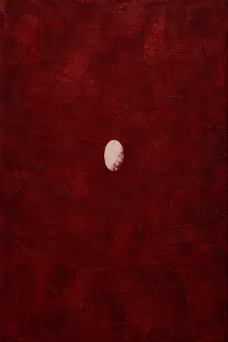 An oval relief on a rough ground in burgundy, black; portrait artwork.
