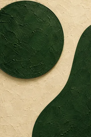 A large circle with a softly shaded edge, off-center in forest green, cream, black, sand; portrait artwork.