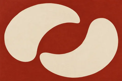 Two interlocking crescents in rust, cream; landscape artwork.