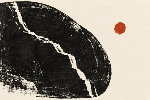 A stone with one white vein in white, black, charcoal, sand; landscape artwork.