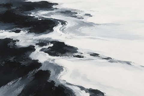 A tidal flat at low water in cream, black, white, stone; landscape artwork.