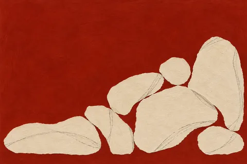A cluster of pebble shapes gathered in one corner in rust, cream, ochre; landscape artwork.