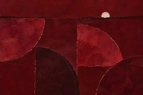 Four quarter-circles turned different ways in burgundy, black; landscape artwork.