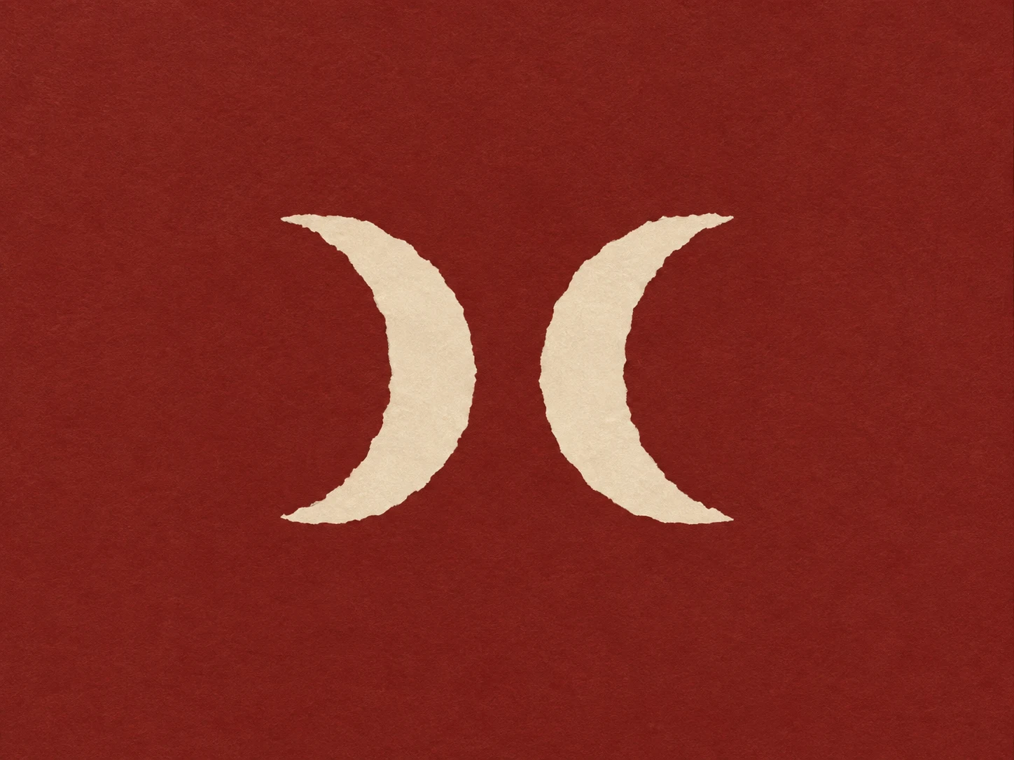 Two crescents turned away from each other in rust, terracotta, burgundy; landscape artwork.