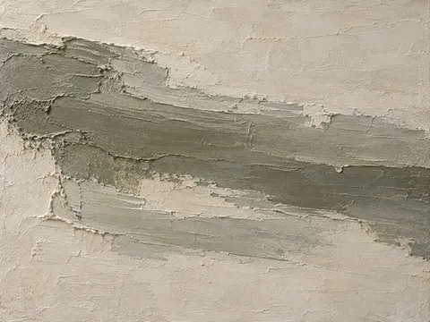 A shallow relief square in stone, olive, taupe, gray; landscape artwork.